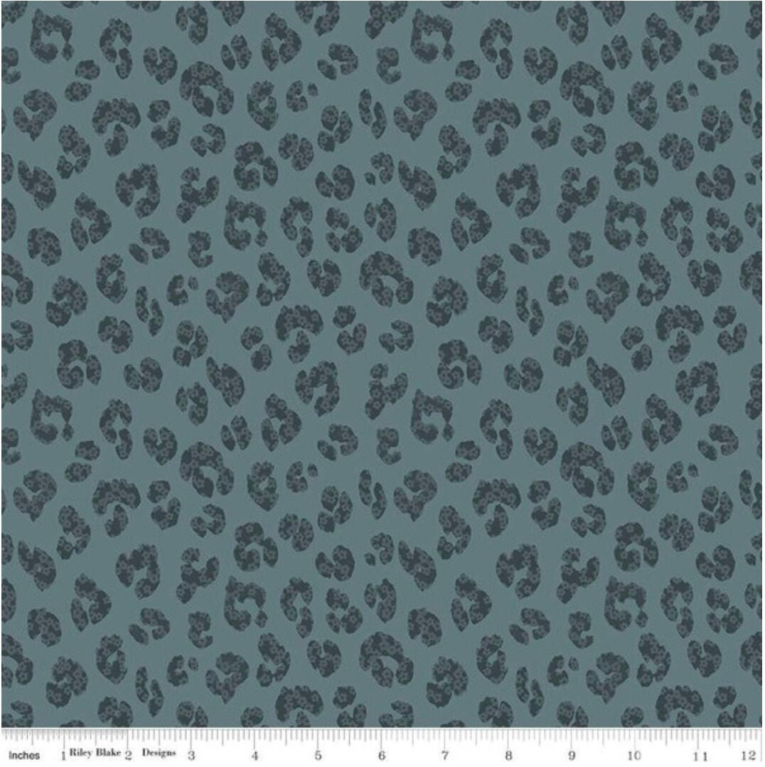 The Waterhole Animal Blue - LAMINATED Cotton Fabric - Riley Blake